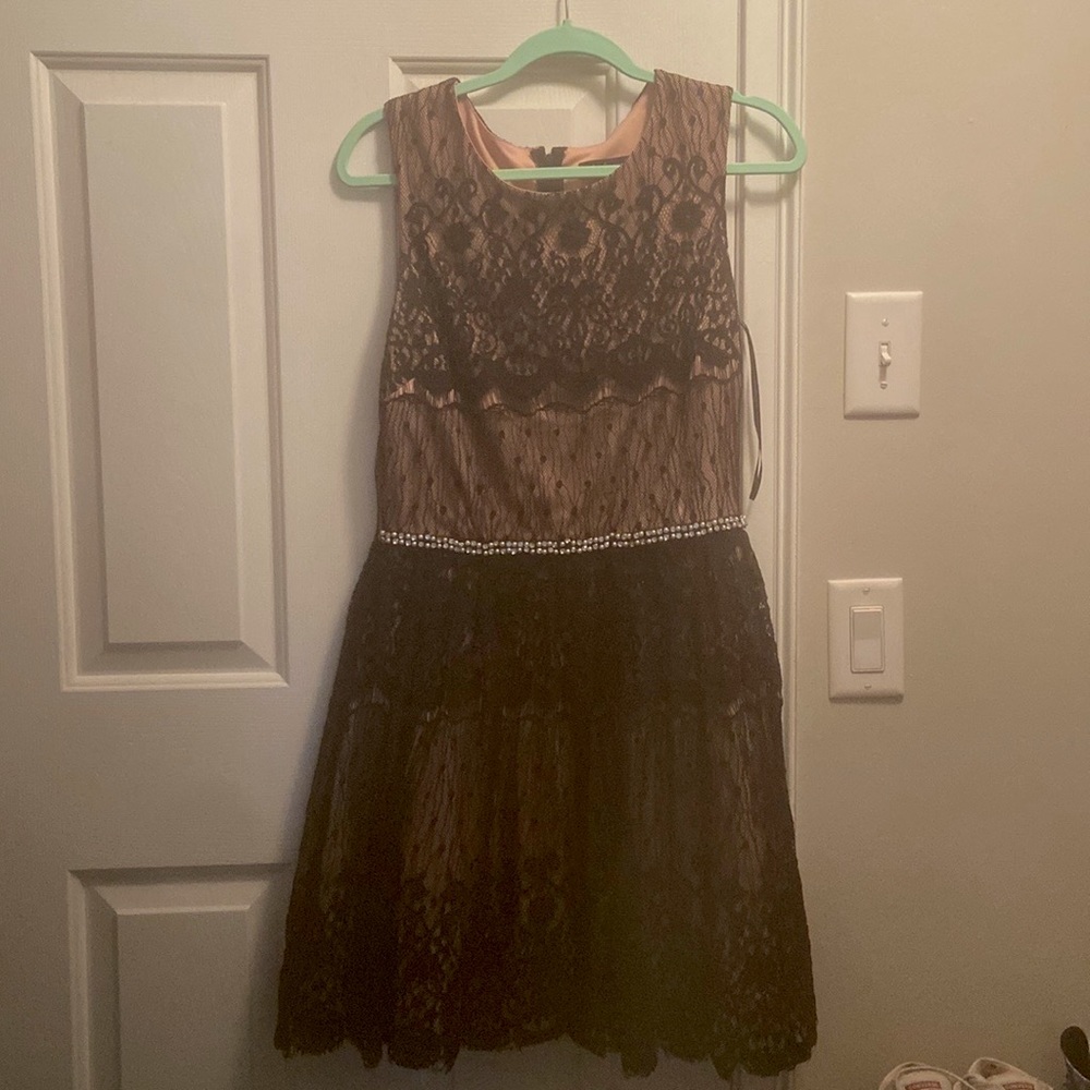 Formal dress. Black and nude colors. Lace detailing with rhinestone belt